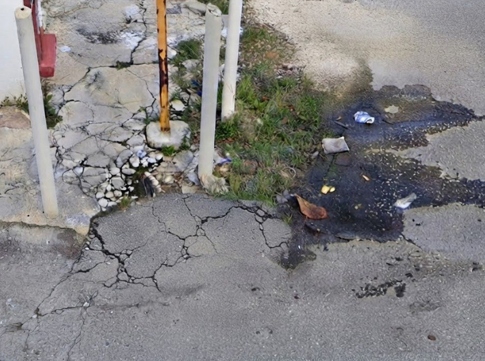 Basura, grietas y abandono deterioran la Calle 36 Poniente